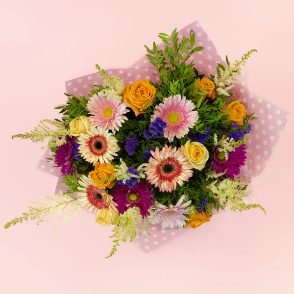Букет из гербер микс, роз микс и статицы